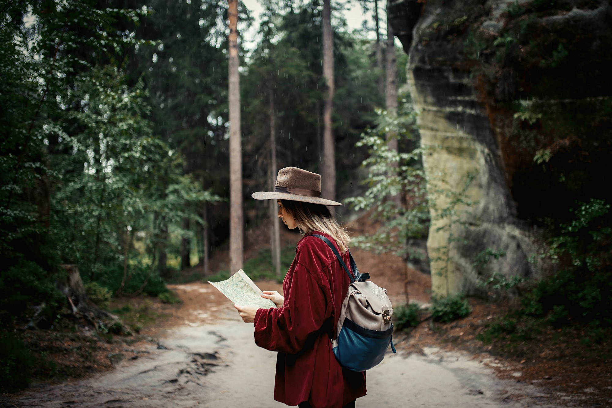 woman with map in a mountains